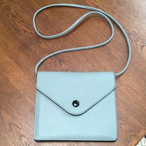 KimchiBlue blue/gray color crossbody bag/lots of individual sections- great cond